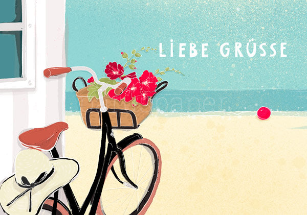 Postkarte Liebe Grüße: Fahrrad mit Hibiskuskorb am Strand – PKGR56