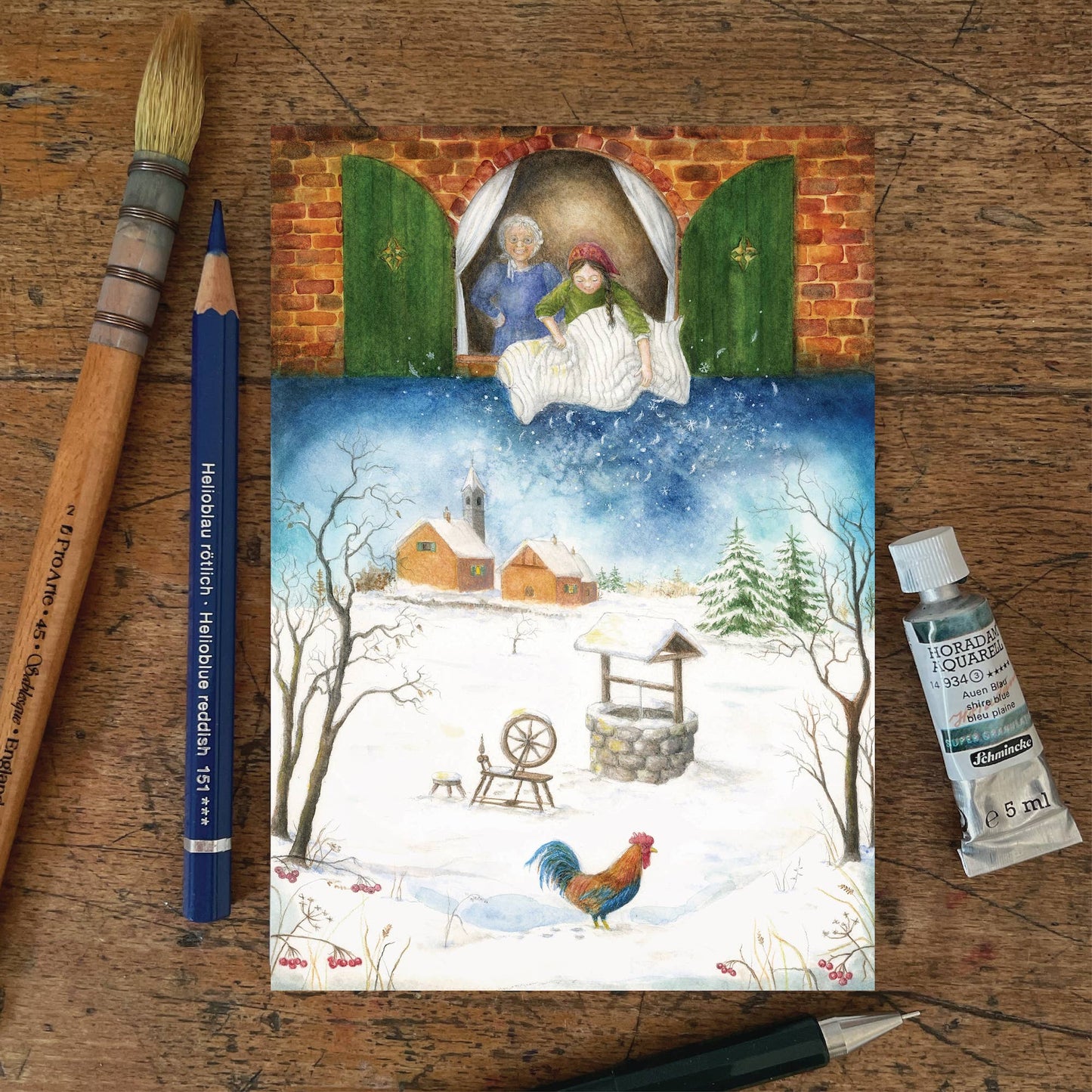 Winter Postkarte Frau Holle PKWI329:
Frau Holle Märchen Schnee Hahn Brunnen
Zeichnung von Mhairi Hellbrandt