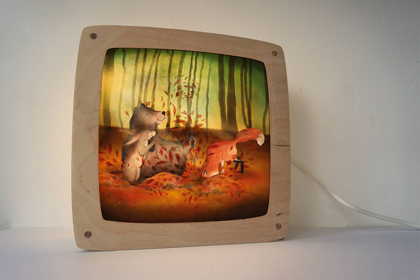 Toverlux Motiv In Blättern spielen – Silhouette mit Bär, Fuchs und Hase im Herbstwald mit Herbstbättern, Lotte Drouen