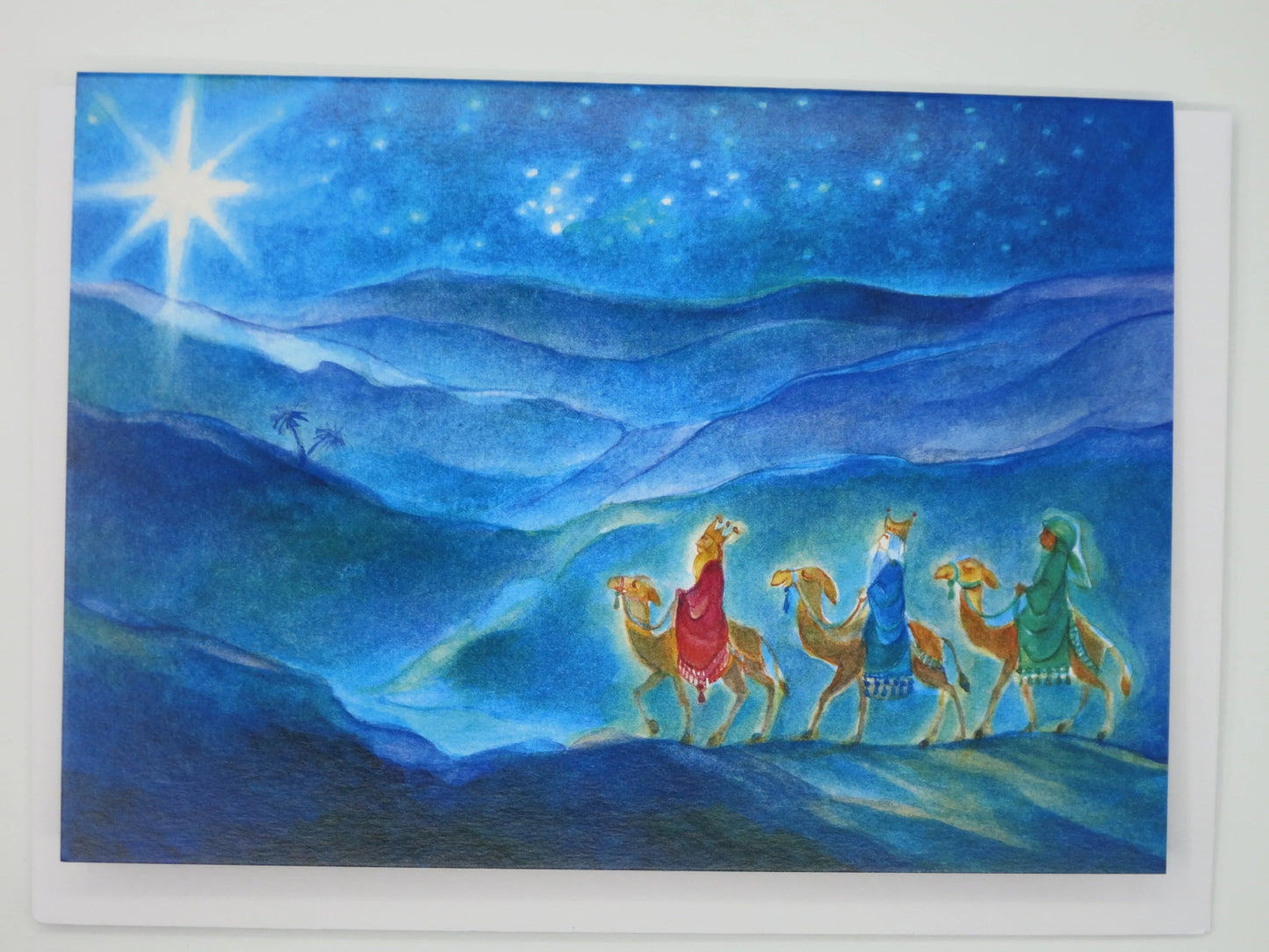 Weihnachtskarte Heilige Drei Könige auf Kamelen unterm Stern von Bethlehem