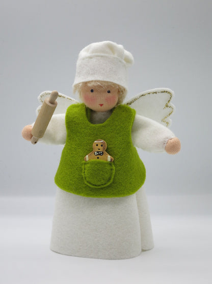 Handgefertigter Backengel Art. WI15 in Weiß und Grün mit Flügeln, Kochlöffel und Lebkuchenfigur für den Winter-Jahreszeitentisch.