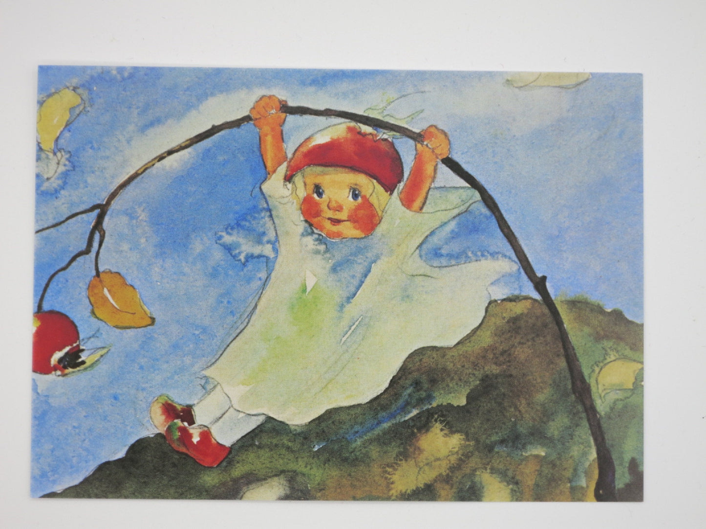 Postkarte Hagebuttenschaukel: Kind schaukelt am Hagebuttenzweig, Mili Weber, Art. PKHE99