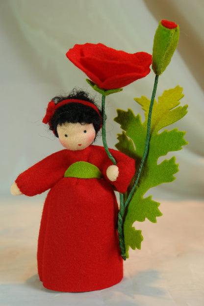 Mohn-Blumenkind mit roter Blüte und tief gezähntem grünem Blatt aus Wollfilz.