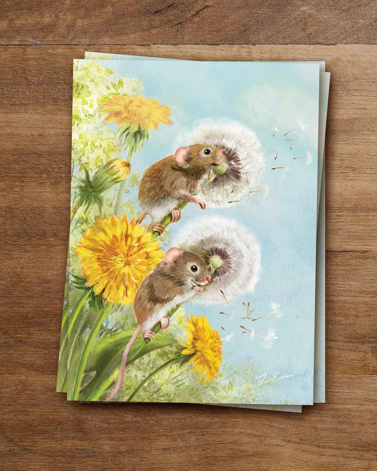 Frühling Postkarte Spaß mit Löwenzahn PKFR36: Zwei Mäuse vergnügen sich mit Löwenzahn und Pusteblumen
Zeichnung von Iris Esther