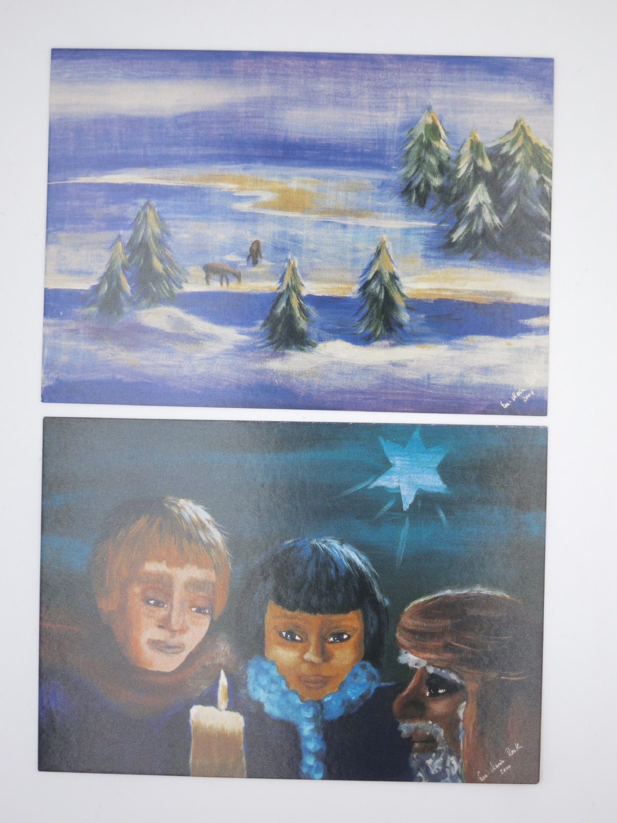 Zwei Karten aus dem Postkartenset Winter: Winterlandschaft und Heilige Drei Könige mit Kerze und Stern
