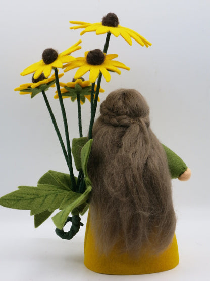 Profilansicht des Sonnenhut-Blumenkindes mit gelben Blüten