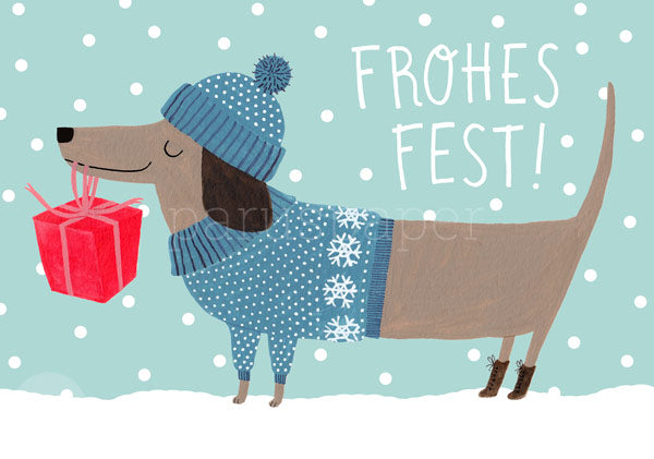 Postkarte 'Weihnachtsdackel': illustrierter Dackel mit Mütze und Pullover hält ein rotes Geschenk im Schnee.